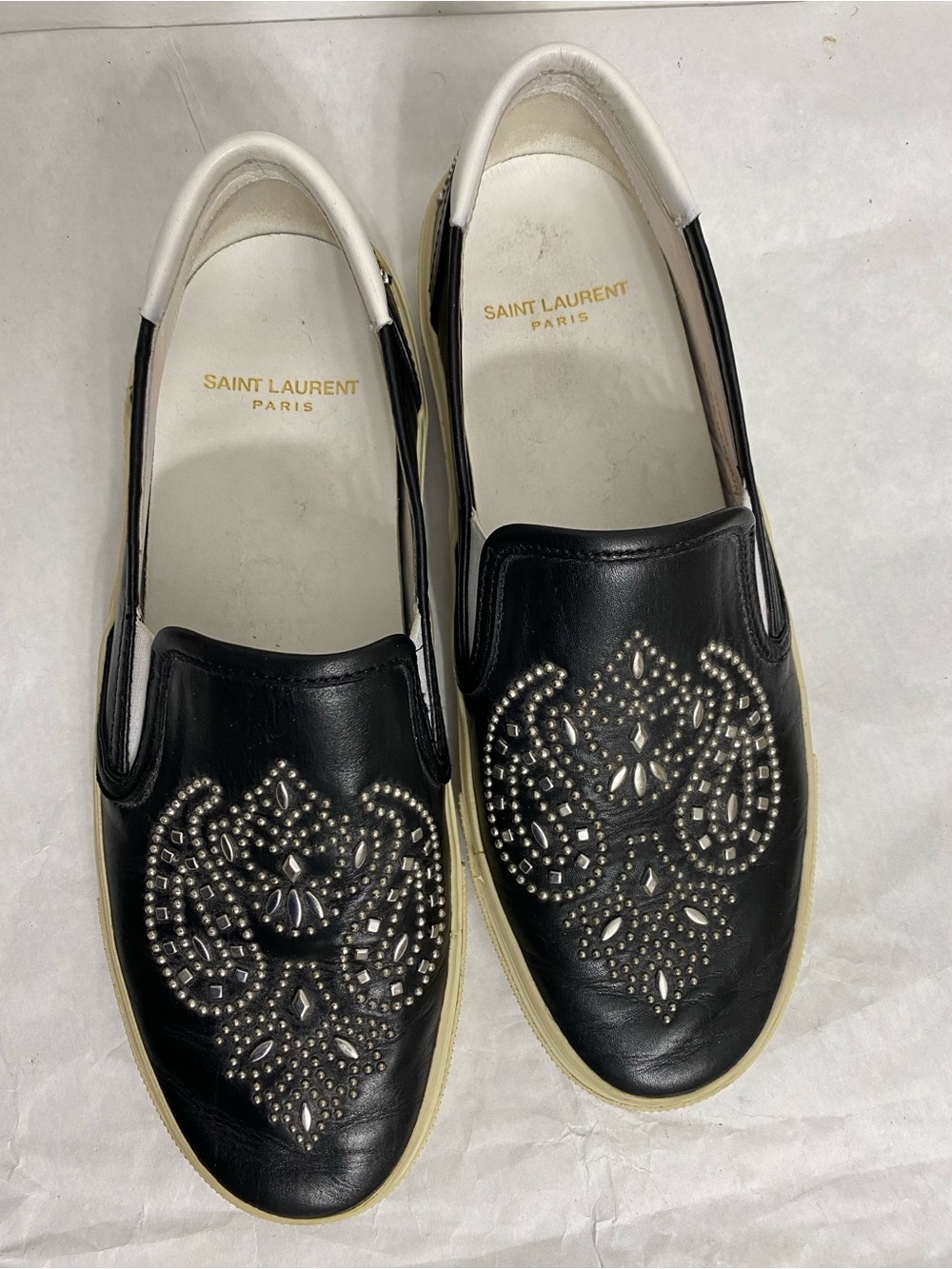 Saint Laurent Black Leather Slip-On Sneakers with Silver Stud Detailing. Size 38